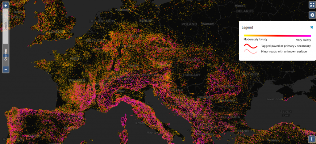 A dark background at low zooms helps highlight differing road-building patterns across countries and continents.